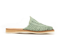 Teal Marbella Huarache Slip-On by Bottomless Co. with woven straps and flat sole, stylish casual footwear.