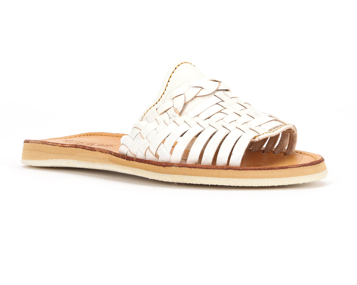 White Huarache Peep-Toe Slides by Bottomless Co. featuring open toe design and woven strap detail.
