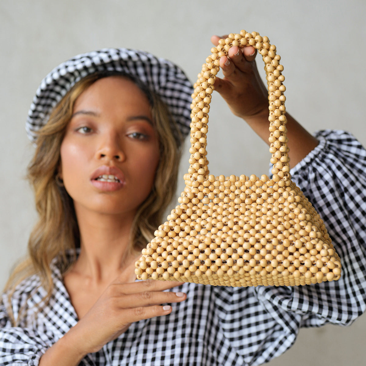 BrunnaCo Pyramid Beaded Tote Bag in toasted beige with geometric bead design and sturdy handles, perfect for stylish everyday use.