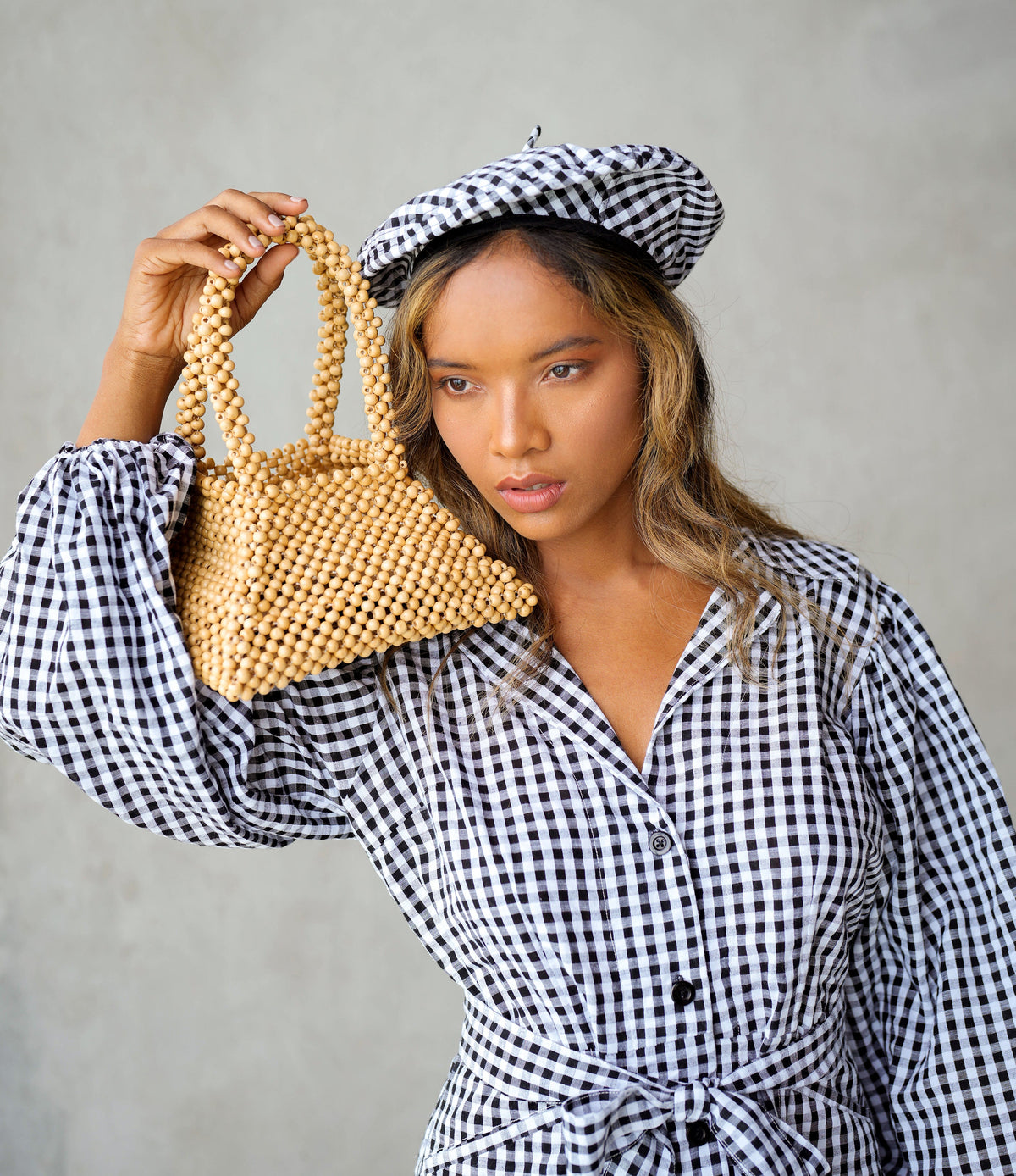 BrunnaCo pyramid beaded tote bag in toasted beige with geometric bead detailing for stylish carry.