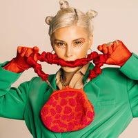 BrunnaCo Arnoldi Jean hand-beaded clutch bag in red and pink with glass bead detailing, elegant evening accessory.