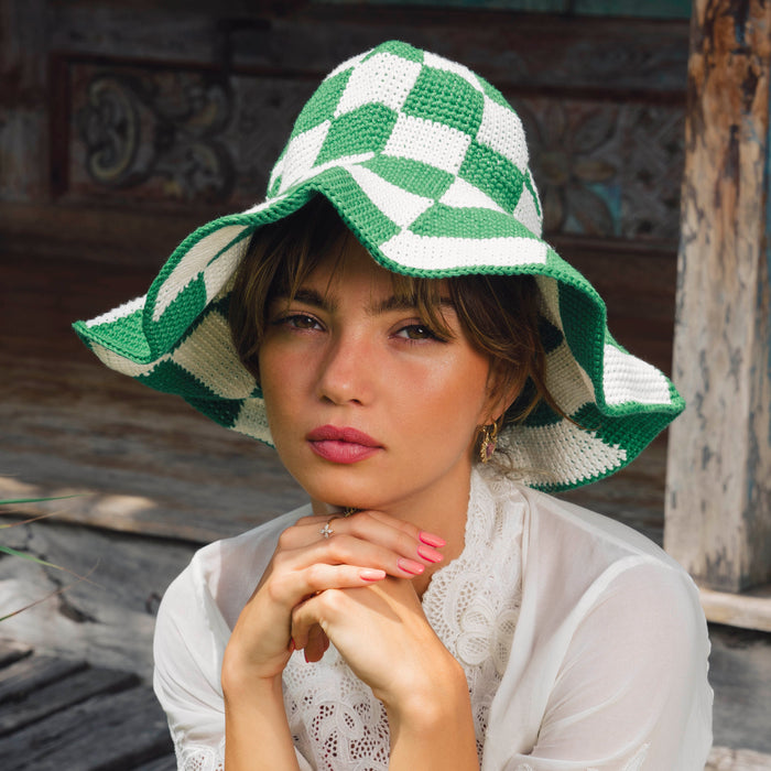 BrunnaCo Shilo checkered crochet hat in green and white, stylish knit hat with checkered pattern and cozy design.