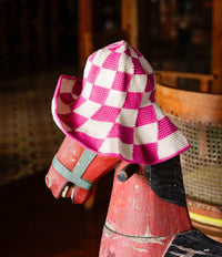 BrunnaCo pink and white checkered crochet hat with a soft, stylish design perfect for casual wear.