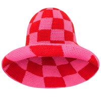 BrunnaCo Shilo checkered crochet hat in red and pink with a cozy, stylish design for women.