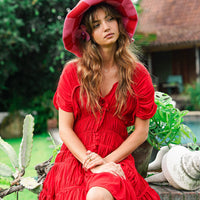 Scarlet red Srikandi Ruffle Dress by BrunnaCo featuring ruffled details and flowy fabric, perfect for elegant occasions.