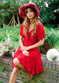 BrunnaCo The Srikandi Ruffle Dress in Scarlet Red, featuring ruffled details and a flowing design, perfect for elegant occasions.