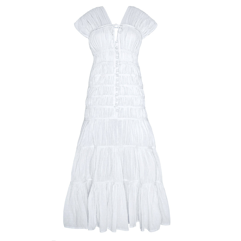 White Srikandi Ruffle Maxi Dress by BrunnaCo featuring flowing fabric and ruffle details, perfect for elegant summer wear.