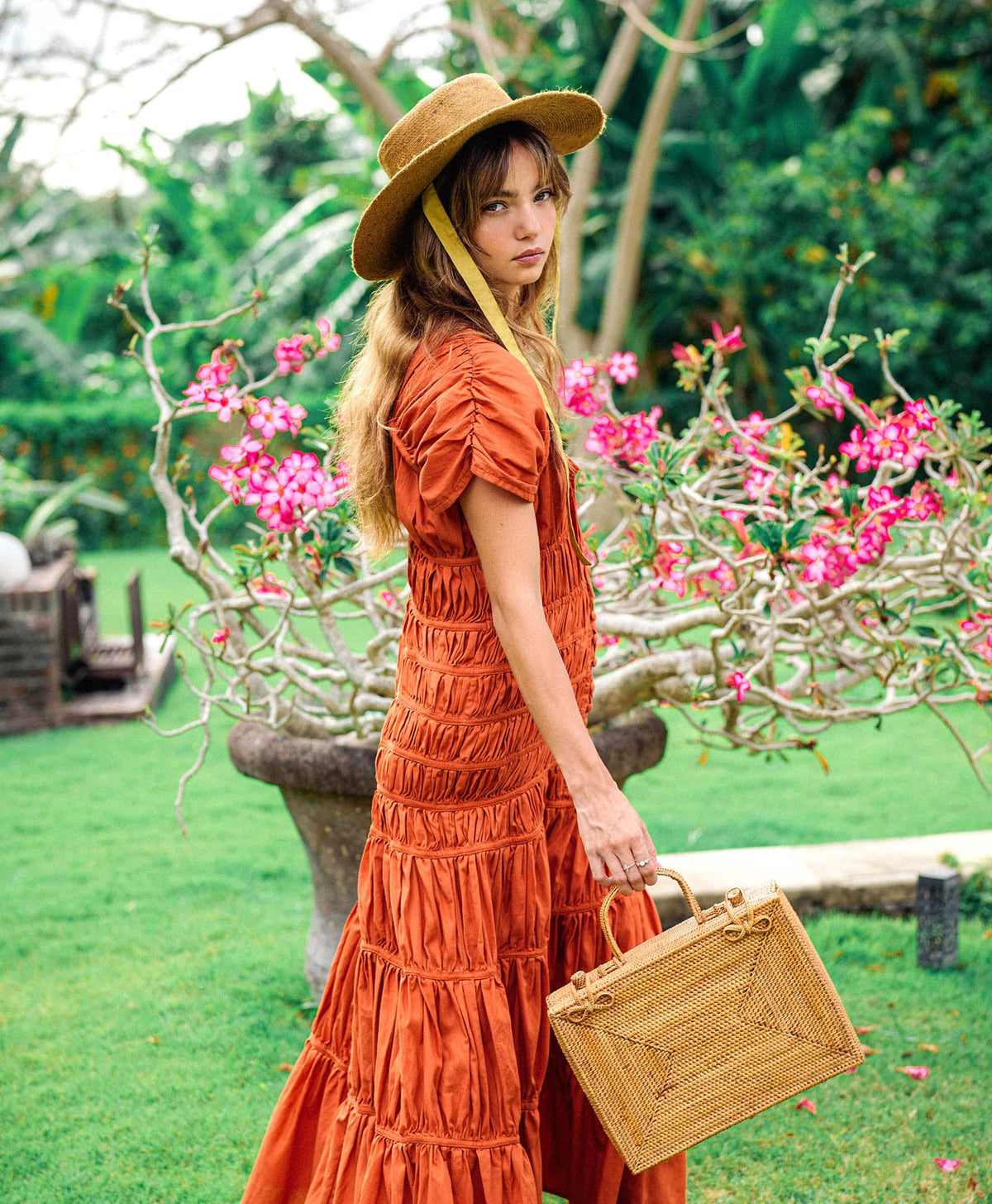 BrunnaCo RAHAYU Atta Rattan Bag in mocca brown with woven rattan design and leather strap, stylish handbag for casual wear.