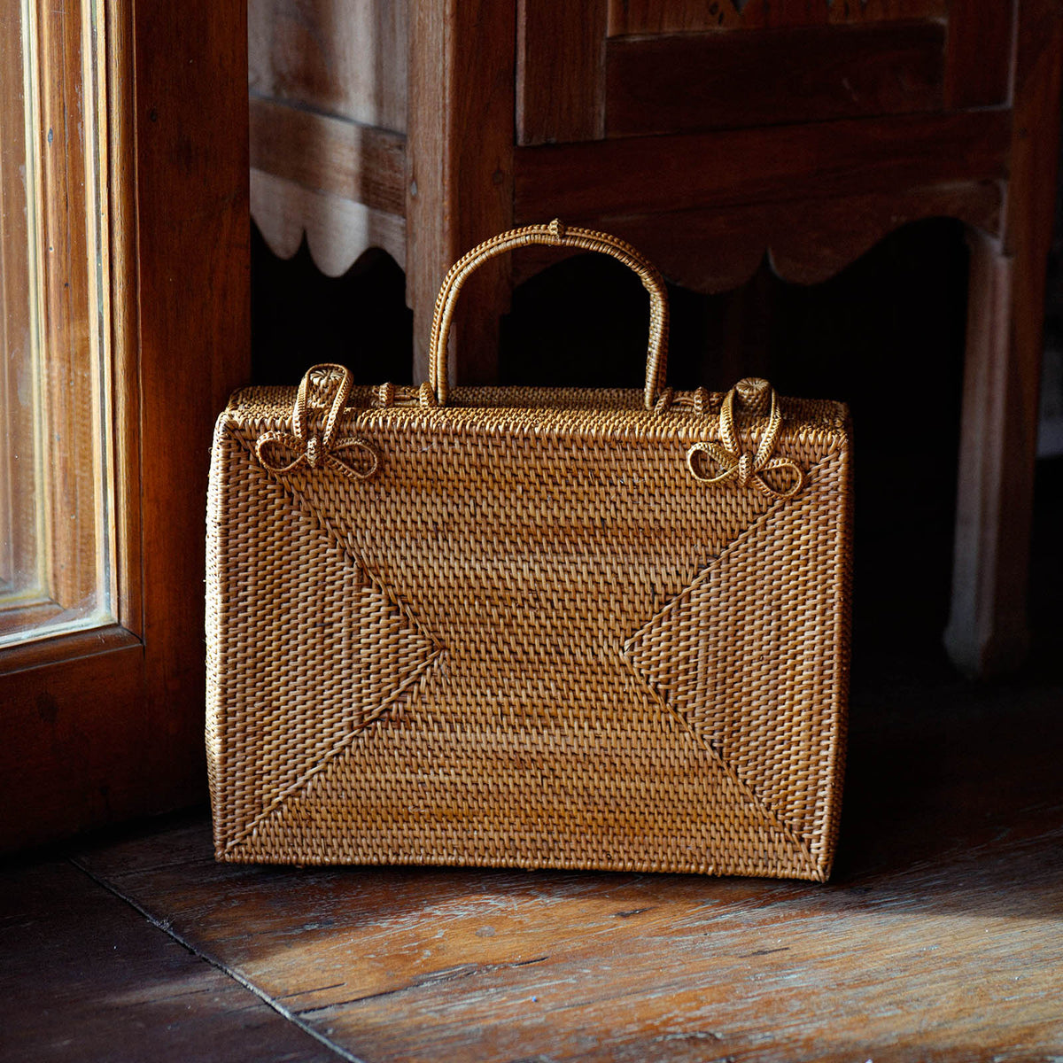 Rahayu Atta rattan handbag in mocca brown with woven design, by BrunnaCo, featuring a stylish, natural-look handcrafted bag.