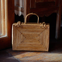 Rahayu Atta rattan handbag in mocca brown with woven design, by BrunnaCo, featuring a stylish, natural-look handcrafted bag.