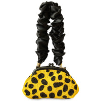 BrunnaCo Arnoldi Venom clutch bag in black and yellow with polka dots and glass bead details, stylish handbag for evening use.