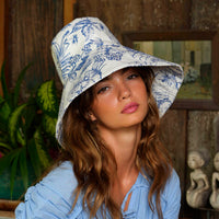 BrunnaCo NAU Botanica hat in indigo blue, stylish wide-brim hat made from breathable material, perfect for sun protection.