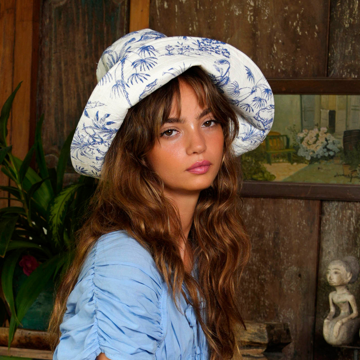 BrunnaCo NAU Botanica hat in indigo blue, stylish wide-brim hat with natural fiber texture suitable for sun protection.