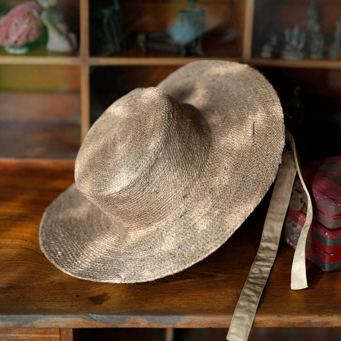 BrunnaCo The Loli Jute Straw Sun Hat in neutral beige with wide brim and woven texture, perfect for sunny days.