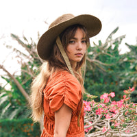 BrunnaCo The Loli jute straw sun hat in neutral beige, lightweight and breathable for sun protection and beachwear.