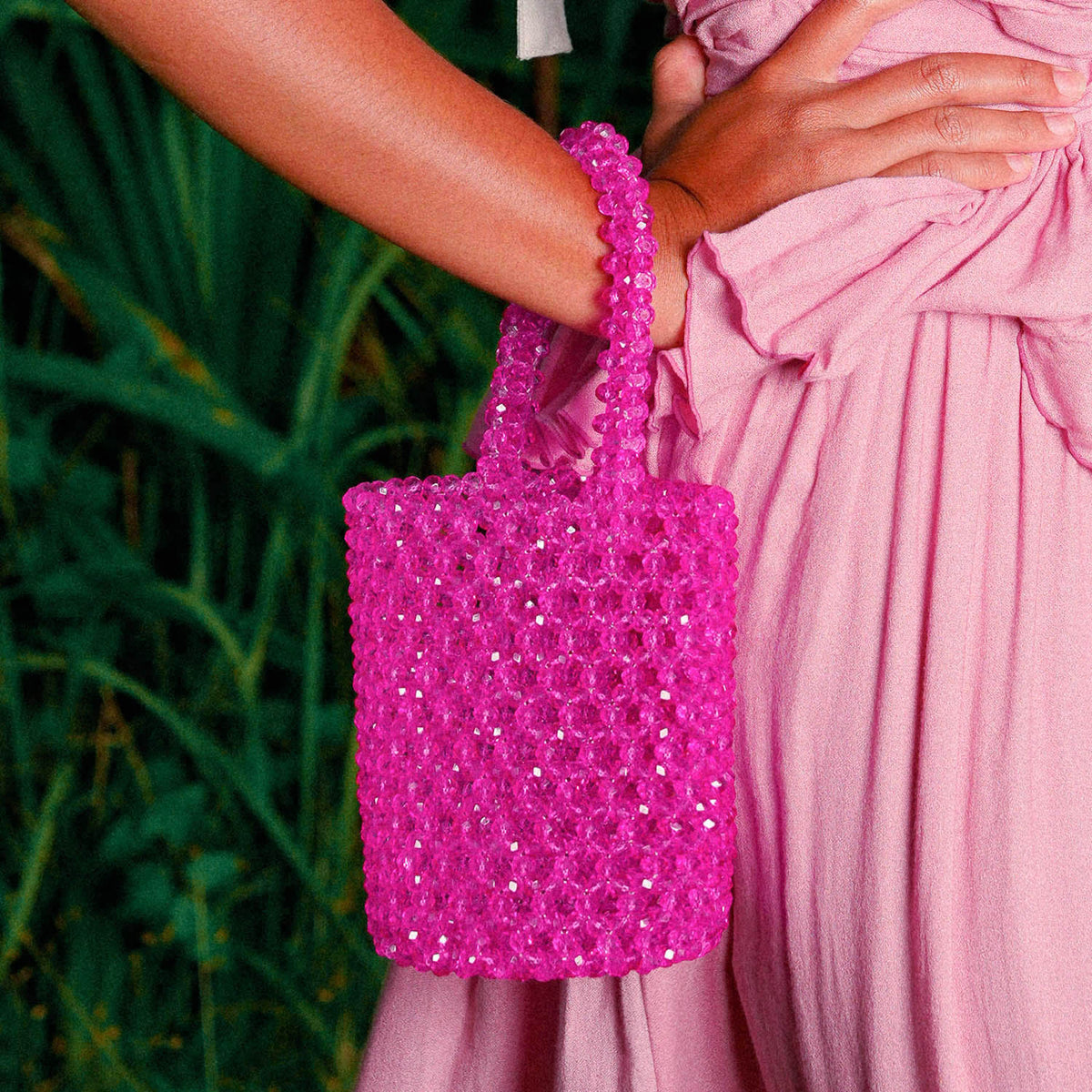 BrunnaCo Antonia crystal beads hot pink tote bag with bucket style and fashionable design, featuring intricate bead details.