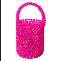 BrunnaCo ANTONIA crystal beads bucket tote bag in vibrant hot pink with beaded details and a stylish shoulder strap.