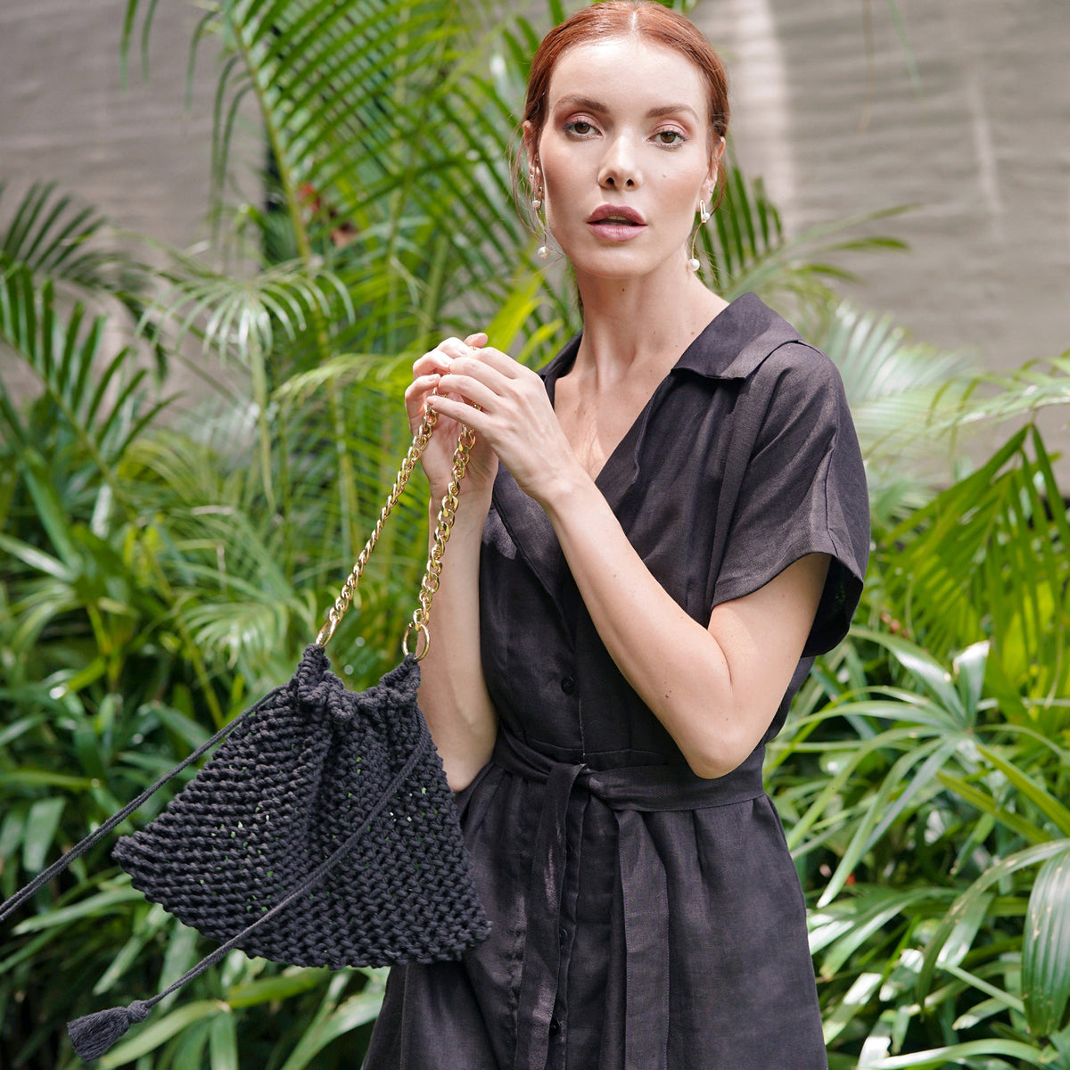 Black LYON macrame tote bag by BrunnaCo, featuring intricate knot details and sturdy handles for everyday use.