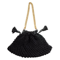 Black BrunnaCo LYON macrame tote bag with woven handles and intricate knotted design, perfect for casual or beach outings.