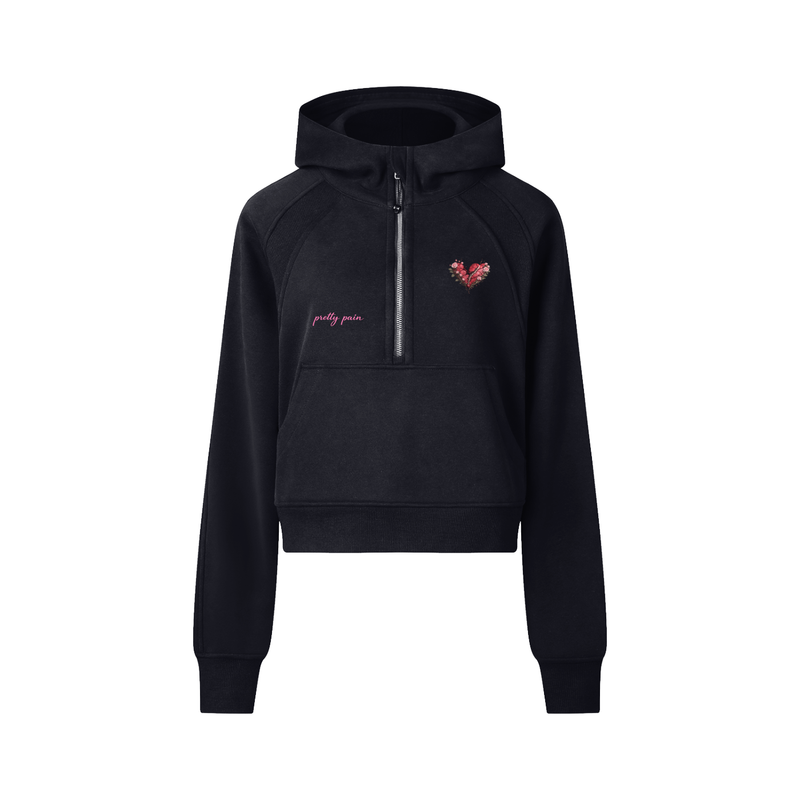 Women’s cropped hoodie by Built From Pain with a half-zip front, shown in a casual, comfortable style.