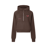 Women’s cropped hoodie by Built From Pain featuring a half-zip front and stylish design.