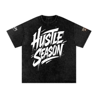 Built From Pain Hustle Season snow washed oversized cotton T-shirt displayed flat with a relaxed fit and casual style.