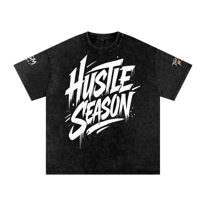 Built From Pain Hustle Season snow washed oversized cotton T-shirt displayed flat with a relaxed fit and casual style.