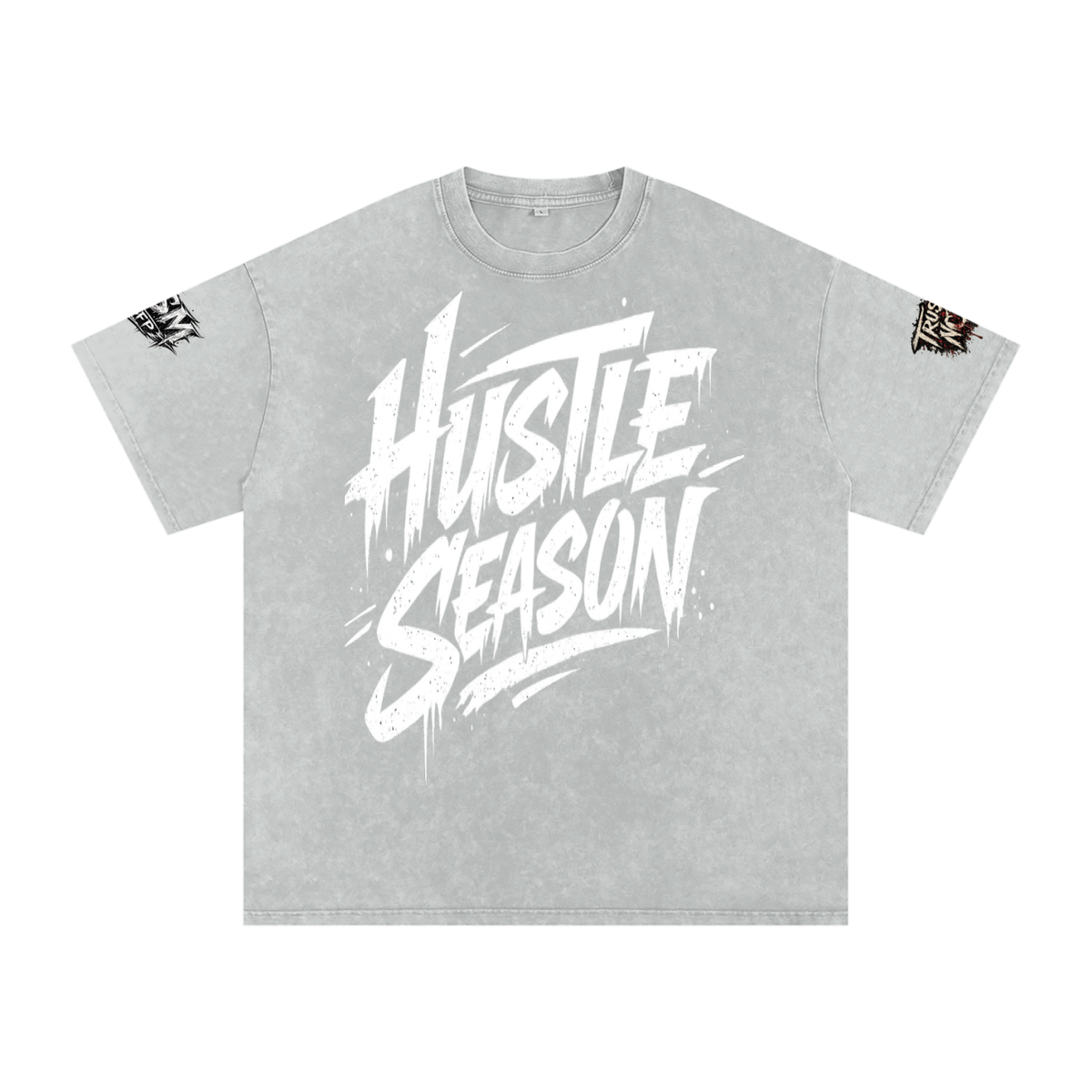Built From Pain Hustle Season snow washed oversized cotton T-shirt displayed on a hanger, showcasing its relaxed fit and textured fabric.