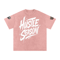 Built From Pain Hustle Season Snow Washed oversized cotton T-shirt displayed flat, showing its relaxed fit and washed fabric texture.
