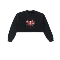 Built From Pain "She Survived Still Blooms" cropped sweatshirt with floral design and bold text on soft fabric.