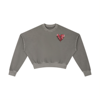 Built From Pain vintage washed cropped sweatshirt with distressed details and relaxed fit, styled on a hanger.