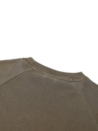 Built From Pain dyed washed raglan long sleeve slim T-shirt showing a faded, vintage-style design with contrasting sleeves.