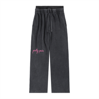 Vintage Washed Waist Pants by Built From Pain, showing relaxed fit and faded denim fabric with a high waist and casual style.