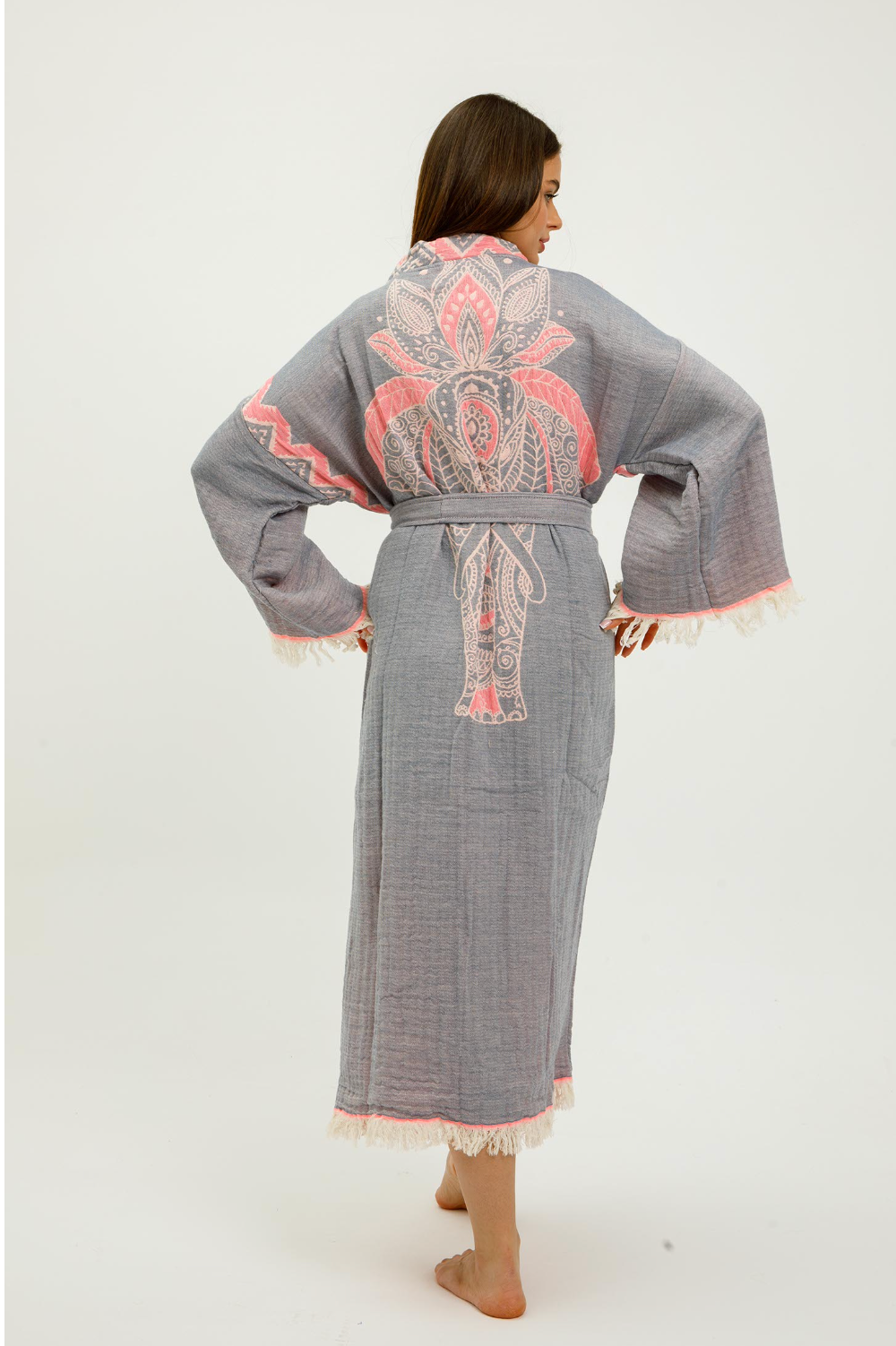 Pink jungle kimono featuring elephant print by buldano, lightweight fabric with intricate jungle and elephant design.