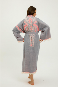 Pink jungle kimono featuring elephant print by buldano, lightweight fabric with intricate jungle and elephant design.