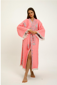 Pink jungle-themed kimono featuring elephant print by buldano, displayed with open front and wide sleeves.