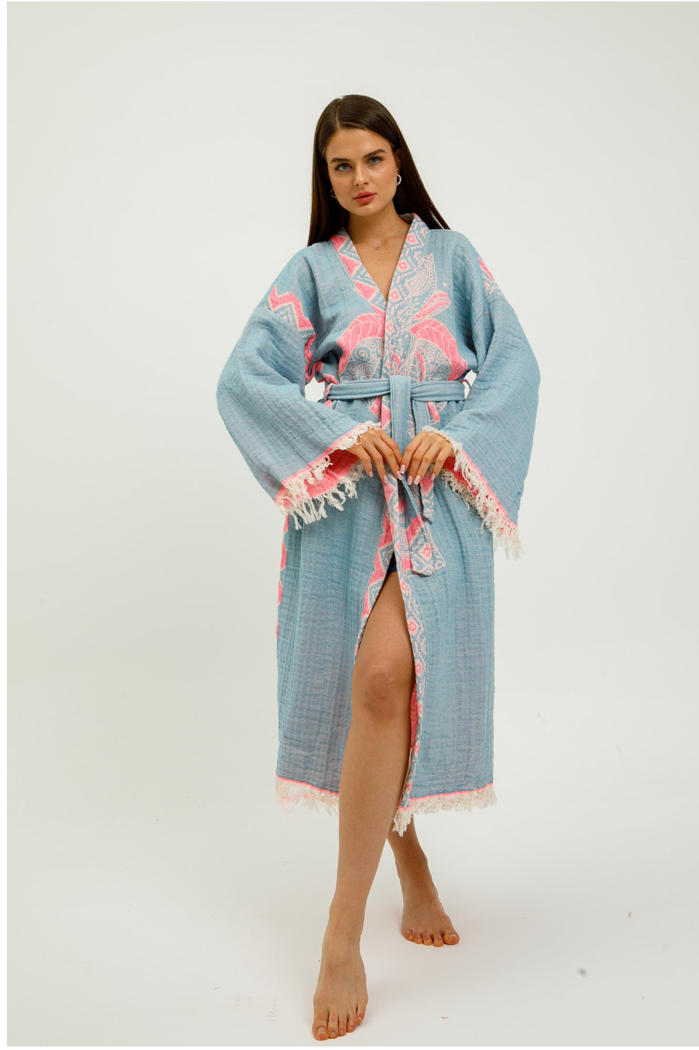 Pink jungle kimono featuring elephant print by buldano, with flowing fabric and vibrant jungle-themed design.