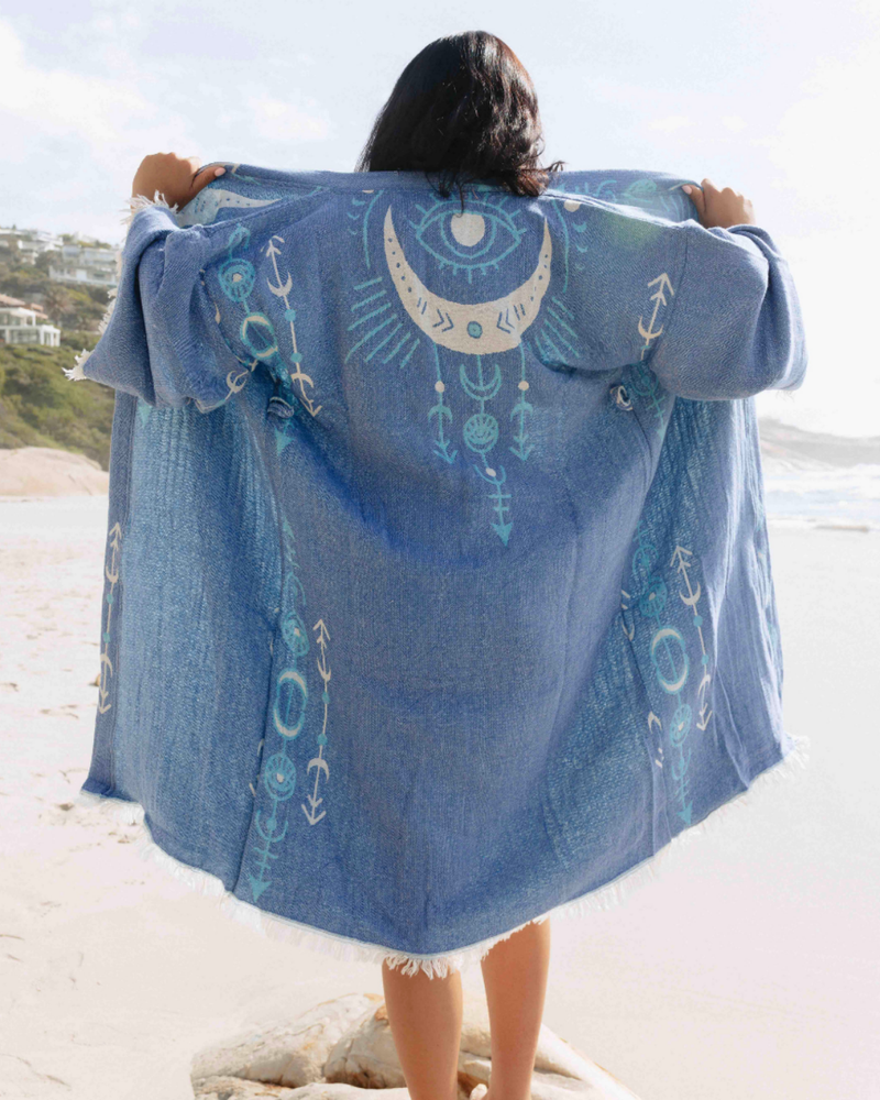Buldano boho kimono with eye and moon print, flowing fabric, and relaxed fit, perfect for casual or bohemian style.