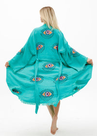 Black evil eye hand-printed kimono by Buldano featuring natural fabric and traditional design for stylish, cultural wear.