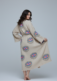 Black buldano kimono with hand-printed evil eye design, featuring natural fabric and traditional Japanese style.