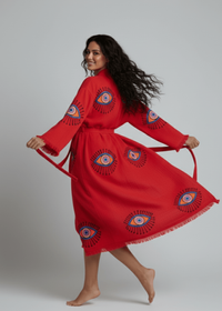 Black evil eye hand-printed kimono from Buldano featuring natural fabric and traditional design.