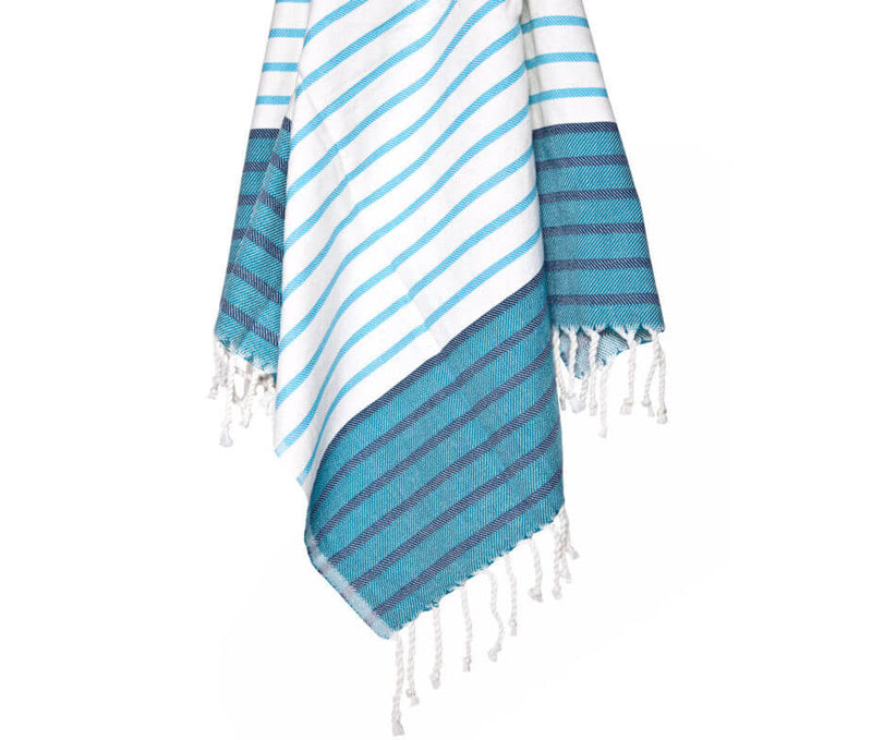 Buldano Nautical Collection Ocean Dream Turkish Towel with blue and white nautical patterns, lightweight and soft for beach use.
