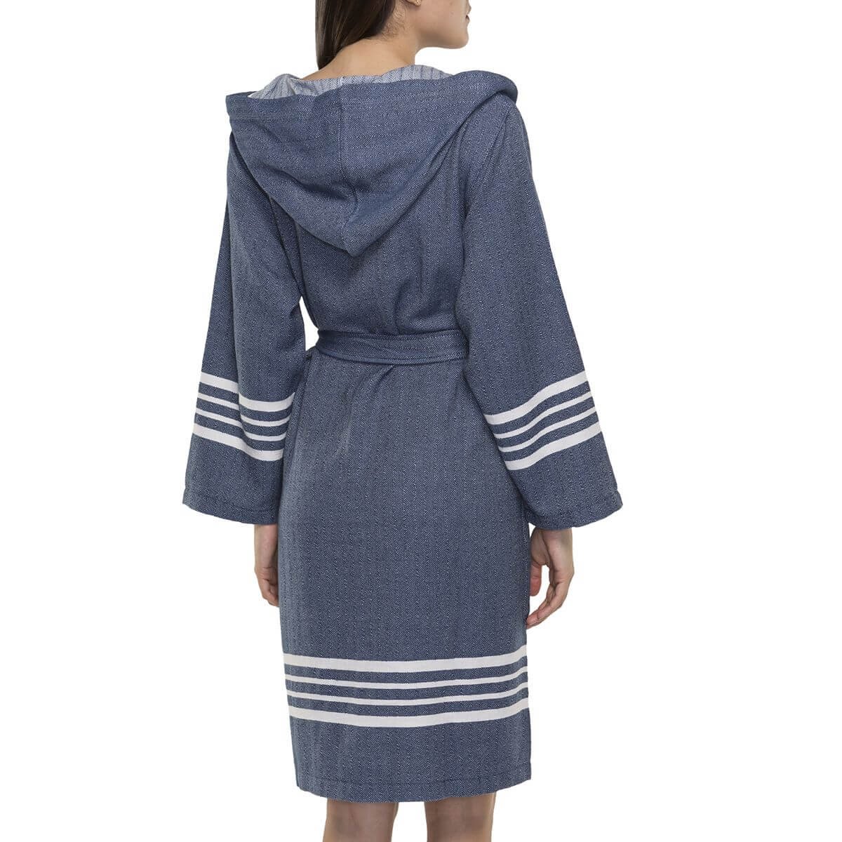 Navy blue organic Turkish cotton short hooded bathrobe from buldano, lightweight Turkish towel for women, hanging on a hook.