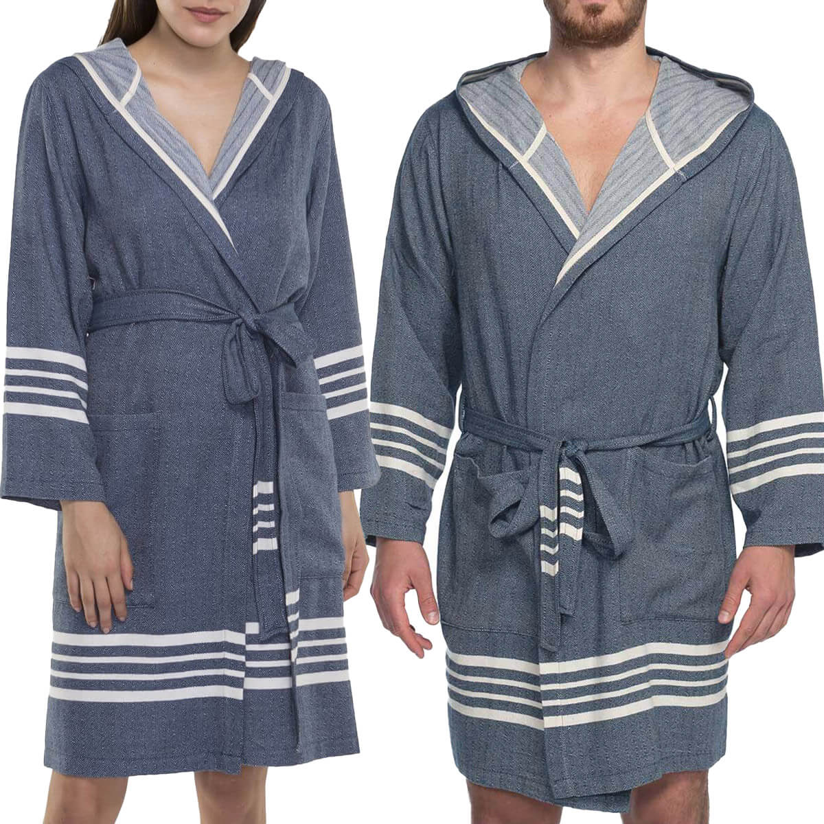 Navy organic Turkish cotton short bathrobe with hood from buldano, lightweight and soft, shown hanging on a wooden hook.