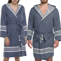 Navy organic Turkish cotton short bathrobe with hood from buldano, lightweight and soft, shown hanging on a wooden hook.