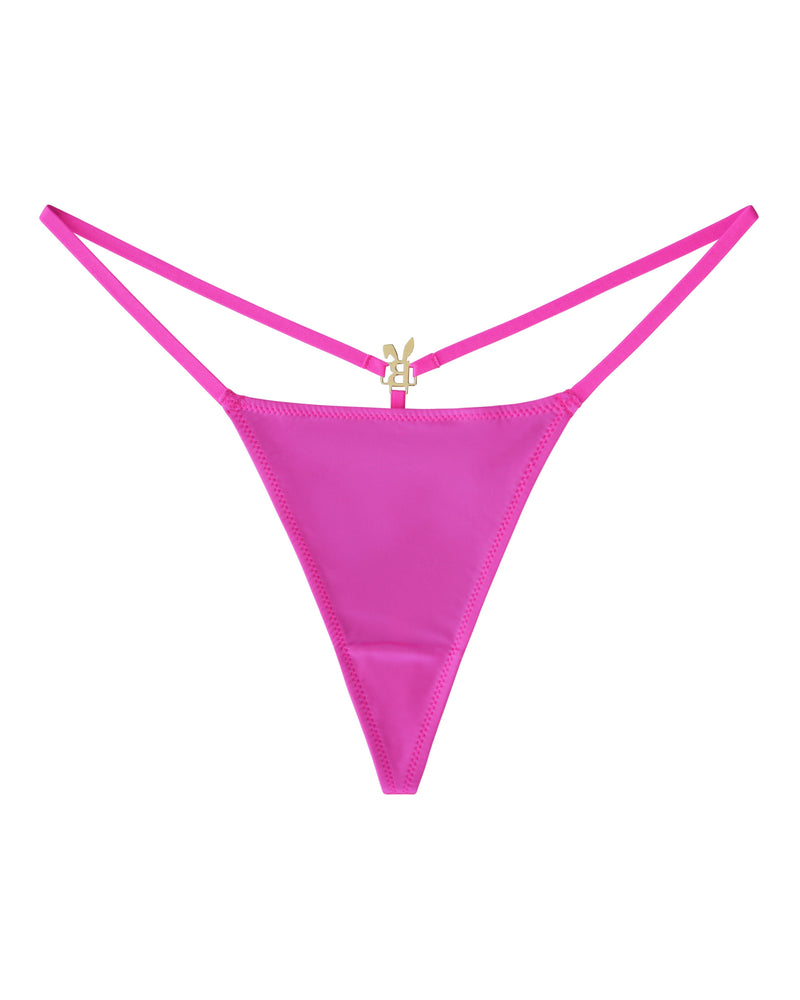 Hot pink BUNNIES ROOM lingerie g-string with thin elastic waistband and minimal coverage on a plain background.
