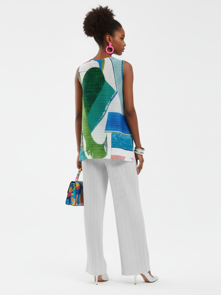 Pleated printed sleeveless top in Coney Island design by BYMANYC New York, featuring vibrant patterns and lightweight fabric.