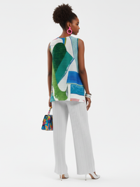 Pleated printed sleeveless top in Coney Island design by BYMANYC New York, featuring vibrant patterns and lightweight fabric.