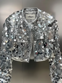Silver sequin jacket for women by BYMANYC New York, featuring shiny sequins and stylish design inspired by Times Square.