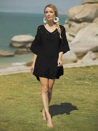 Crochet V-neck beach cover-up dress by Trendsi, featuring a lightweight, breathable design perfect for summer beachwear.